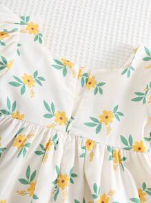 Cozy Pixies Babymeisjesjurk met pofmouwen en getailleerde taille en ditsy bloemenmotief