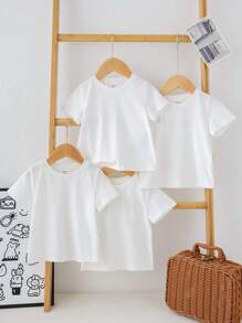 SHEIN Set de 4 piezas de camisetas de manga corta de cuello redondo de punto suave de unicolor unisex para niño bebé - Blanco - Ver 4