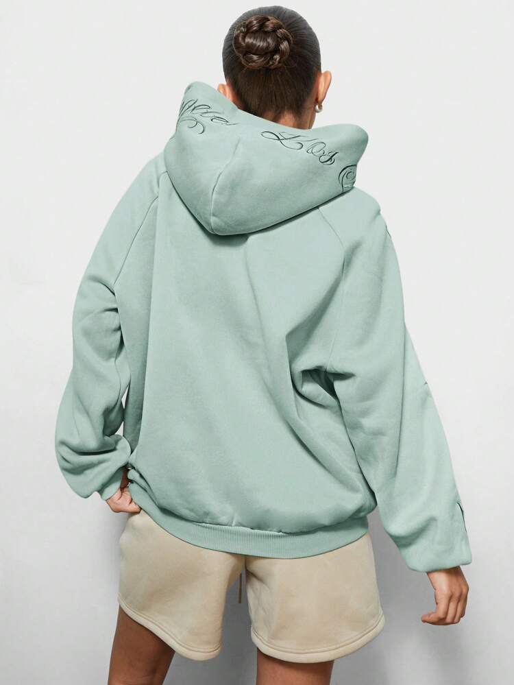SUMWON Oversized Script Sleeve Hoodie Pullover Signature Collection Fall Winter Sport Loungewear Essential Kangaroo Pocket Casual Athleisure Streetwear