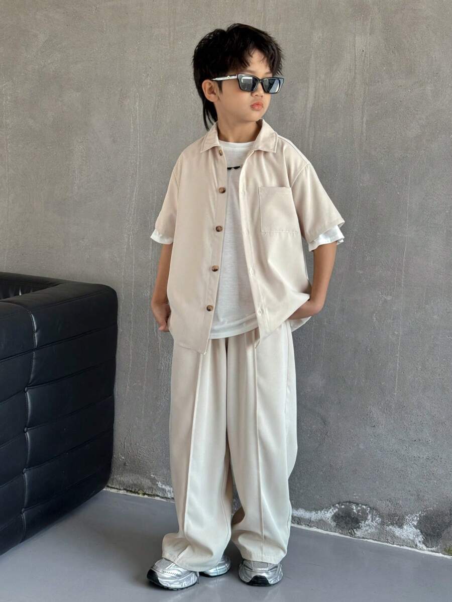 SHEIN Leap Crew 2pcs Tween Boy Casual Solid Color Collared Pocket Short Sleeve Shirt And Elastic Waist Pants Set, Suitable For Autumn, Spring, Summer, For Outdoor Play, School, Street, Party And Leisure - Khaki - View 1