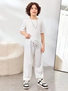 SHEIN Set de 3 piezas para niños pequeños: chaleco gráfico sin mangas con capucha, camiseta y pantalón de chándal de estilo casual - Multicolor - Ver 5