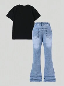 SHEIN Conjunto casual urbano de 2 piezas para niñas preadolescentes: Camiseta negra de manga corta y hombros caídos con estampado de girasol y jeans acampanados con estampado floral rasgado - Negro - Ver 2