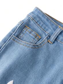 SHEIN Jeans de mezclilla negros y blancos para niños preadolescentes con efecto desgastado, rasgado y asimétrico, de tiro medio y silueta ajustada, para ropa de otoño de niños preadolescentes
