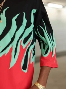 PAVTROS Áo thun nam Manfinity Streetrush phong cách đường phố trẻ trung, gồm áo thun kiểu áo bóng rổ màu đen nổi bật với họa tiết ngọn lửa 3D màu đỏ và xanh lá cây rực rỡ, cùng thiết kế tay lỡ cổ tròn. Chiếc áo thun kiểu áo bóng rổ này có hình in lớn, tạo nên một món đồ thời trang đường phố hoàn hảo theo phong cách Y2K và là một ý tưởng quà tặng tuyệt vời dành cho bạn trai hoặc chồng. - màu đen - Xem 6