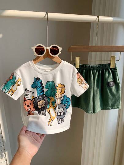 SHEIN Áo thun dệt kim cổ tròn dáng rộng, in hình động vật hoạt hình dễ thương, thích hợp cho mùa xuân và mùa hè.