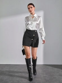 RueChic Damesrok met knopen en details van massief goud