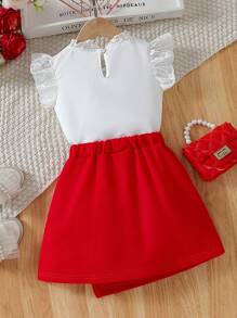 Formele set van 2 stuks voor jonge meisjes, witte blouse met kanten kraag en ruches en asymmetrische zoom, strik in de taille, elegante zomeroutfit