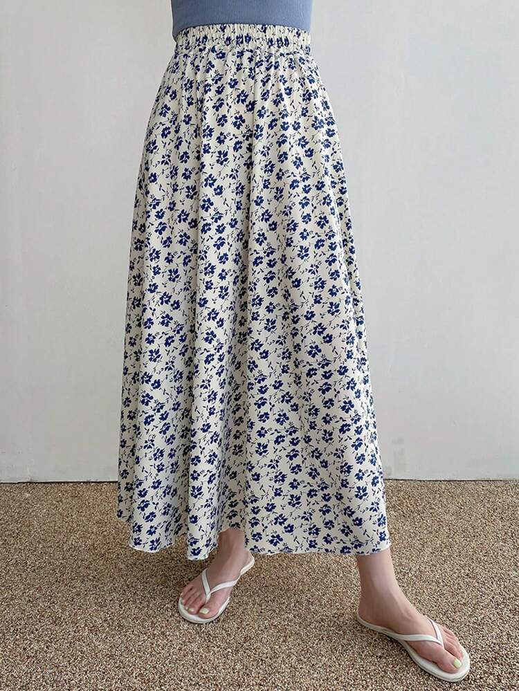 Falda larga de línea A con estampado floral diminuto en toda la superficie, de cintura elástica, color blanco, apta para todas las estaciones, faldas de otoño
