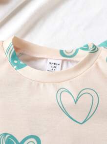 Conjunto de 2 piezas para niñas con camiseta de manga corta con estampado de corazón y pantalones con cordón y gráfico de corazón, conjunto de verano para uso diario, salidas, deportes, 4 piezas/set
