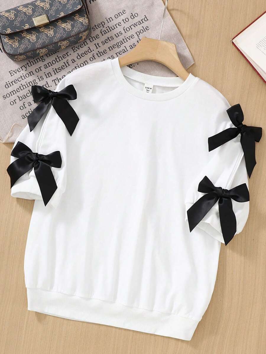 SHEIN Áo thun cổ tròn tay lửng dệt kim màu trắng rộng rãi cho bé gái tuổi teen có nơ trang trí, màu tương phản dễ thương thường ngày, phù hợp cho mùa xuân và mùa hè - Đen và trắng - Xem 1