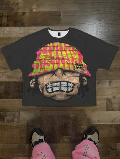 Manfinity EMRG Camiseta de hombre de cuello redondo acortado de manga corta, con estampado de cabeza de dibujo animado oversize, top holgado de estilo calle