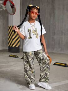 SHEIN Set de 2 piezas Camiseta con estampado de número casual y de rama de árbol camuflado + Pantalones de camuflaje para niñas preadolescentes
