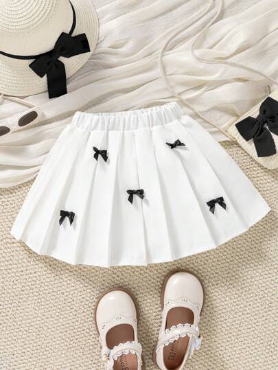 SHEIN 年轻女孩褶皱 A 字裙，蝴蝶结装饰撞色，百搭适合校园风格