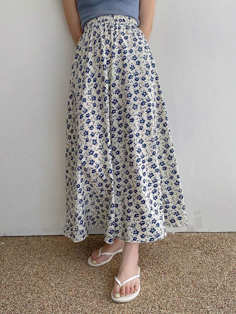 Falda larga de línea A con estampado floral diminuto en toda la superficie, de cintura elástica, color blanco, apta para todas las estaciones, faldas de otoño