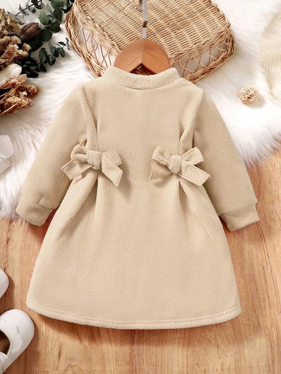 SHEIN Vestido corto informal para bebés con mangas largas, diseño de moño y color liso