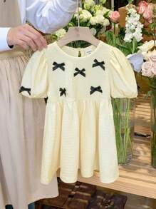 SHEIN LMoss Kids Abito estivo a maniche corte per bambine con decorazione fiocco carino - Albicocca - Visualizzare 10