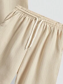 SHEIN Ensemble de chemise à manches courtes ample et short en tissu à texture tissé pour les vacances, tenue décontractée quotidienne pour adolescents garçons