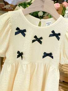 SHEIN LMoss Kids Abito estivo a maniche corte per bambine con decorazione fiocco carino - Albicocca - Visualizzare 3