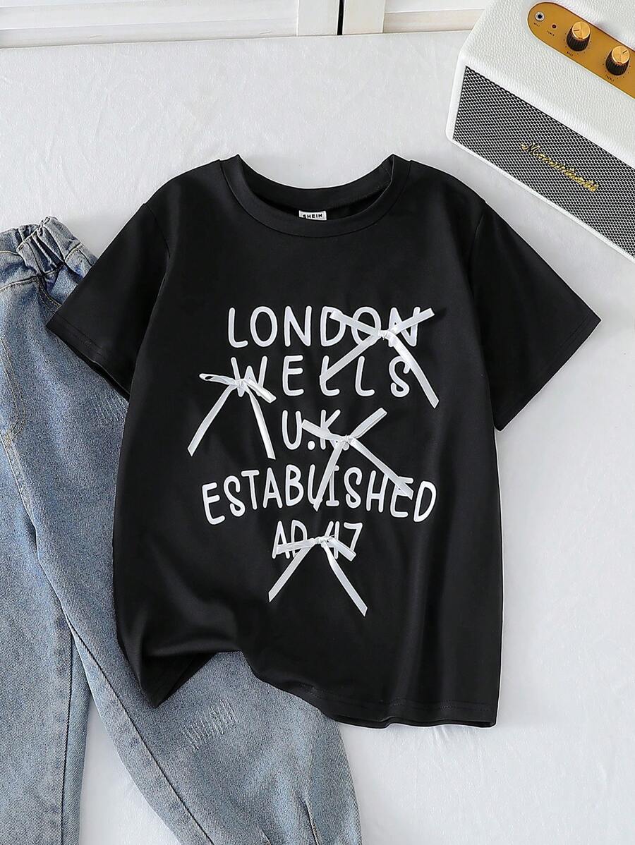 SHEIN Young Girls' Fashion Digital Letter Print Bow Knitted Casual Round Neck Short Sleeve Plain T-Shirt, Summer - Black - View 1