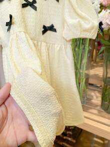 SHEIN LMoss Kids Abito estivo a maniche corte per bambine con decorazione fiocco carino - Albicocca - Visualizzare 7