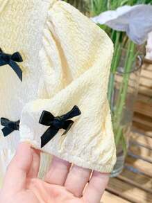 SHEIN LMoss Kids Abito estivo a maniche corte per bambine con decorazione fiocco carino - Albicocca - Visualizzare 5