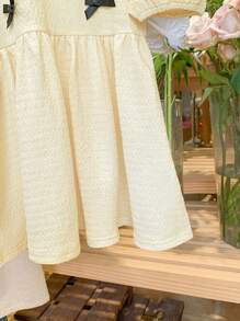 SHEIN LMoss Kids Abito estivo a maniche corte per bambine con decorazione fiocco carino - Albicocca - Visualizzare 4