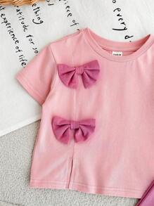 Conjunto de 2 piezas para bebé niña con blusa de manga corta y lazo rosa, y pantalones para verano