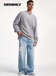 Jeans vintage décontractés, amples et usés, style urbain neutre pour ados, unisexe. Avec poches avant et plates à l'arrière.