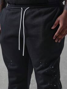 SUMWON Pantalon de survêtement ample avec éclaboussures de peinture, coupe évasée. Bas d'entraînement de mode urbaine, pantalon jogging tout saison. Tenue décontractée pour l'athléisme