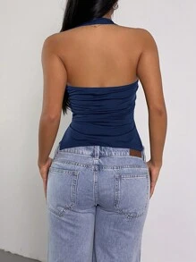 SHEIN SXY Top casual negro sin mangas con abertura en el bajo y cuello de halter