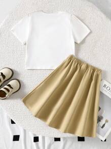 SHEIN Set de 2 piezas compuesto por una blusa corta de punto blanco y caki con efecto 2 en 1, y una falda larga de línea A en color caqui para niña joven