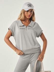 Tropiluxe Camiseta suelta de yoga y fitness con hombros en oblicuo para mujer, camiseta deportiva de manga corta ideal como cubrimiento para correr