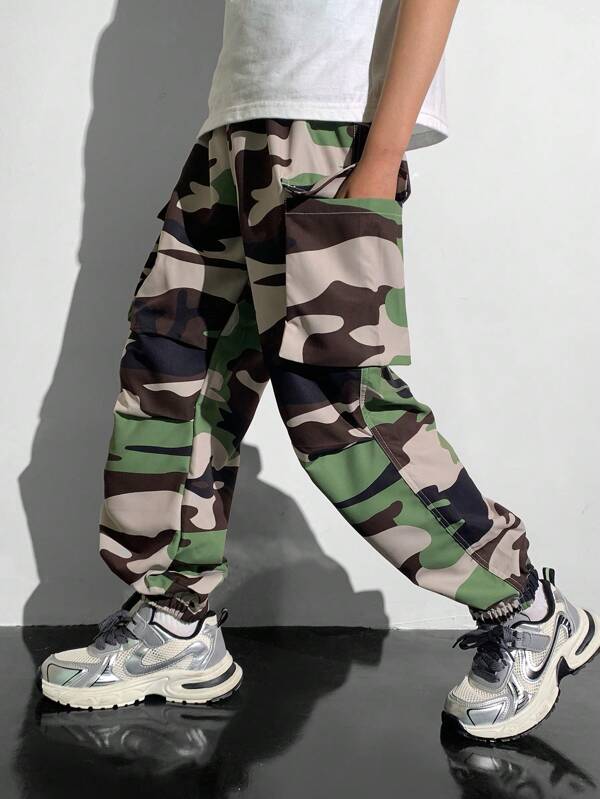 Tween Boy Casual Versatile Comfortable Street Camo Printed Pattern Applique Pockets Drawstring Loose Woven Pants, Suitable For School, Garden, Beach, Birthday, Spring/Summer/Fall/Winter Seasons