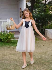SHEIN Vestido elegante, hermoso y adorable para niña preadolescente, sin tirantes, con manga de malla abullonada y lazo, en negro y blanco, apropiado para verano y primavera, ideal para fiestas y vacaciones - Blanco y Negro - Ver 3