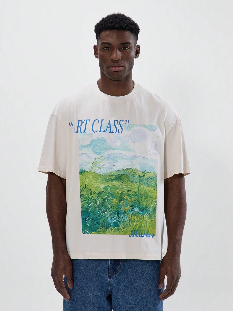Musero Camiseta de manga corta con cuello redondo, hombros caídos y gran estampado gráfico con el lema "ART CLASS", una prenda esencial para la y el verano - Albaricoque - Ver 1