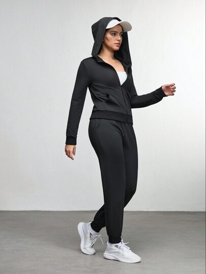 Ensemble femme pour l'extérieur, Top zippé à capuche et pantalon de couleur unie