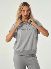 Tropiluxe Camiseta suelta de yoga y fitness con hombros en oblicuo para mujer, camiseta deportiva de manga corta ideal como cubrimiento para correr