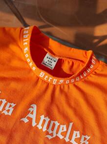 SHEIN Camiseta informal y deportiva para niños pequeños con patrón gráfico de estampado de letras, simple y cómoda para uso diario