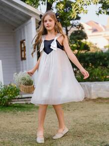 SHEIN Vestido elegante, hermoso y adorable para niña preadolescente, sin tirantes, con manga de malla abullonada y lazo, en negro y blanco, apropiado para verano y primavera, ideal para fiestas y vacaciones - Blanco y Negro - Ver 5