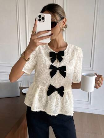 Serisse Women's Elegant Bowknot Decoration Solid Color Short Sleeve Cut Flower Chiffon Shirt,Jacquard Textured Babydoll,Romantic Jacquard Flower Summer Tops,Colorful Bow Chiffon Summer Blouse,Ruffled Top, For Everyday Wear,French Holiday Casual Outfits