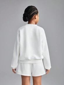 SHEIN Conjunto informal de 2 piezas de sudadera con hombros caídos y shorts con estampado de leopardo y estrellas para niñas preadolescentes, de primavera/verano, de ajuste holgado