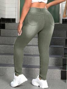 SHEIN EZwear Jeans pitillo de talla grande de mezclilla azul de lavado medio elásticos y rasgados, de aspecto sexy