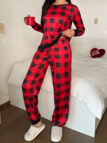 Conjunto de pijama de top sencillo de manga larga y pantalones con estampado a cuadros rojo y negro de cuello redondo para mujer