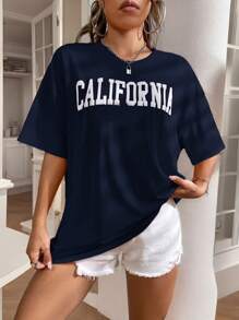 SHEIN Frenchy Blusa de cuello redondo de manga corta con estampado de letras para uso casual, uso diario