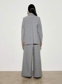 AiiRZ Ensemble veste blazer surdimensionnée et pantalon palazzo professionnel. Tailleur formel avec pantalon ample. Tenue de travail de bureau, look exécutif contemporain pour la carrière