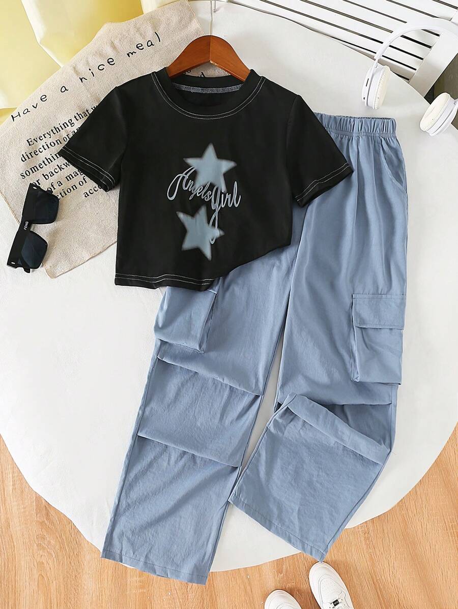SHEIN مجموعة بنطلون قصير وتوب قصير مطبوع بالنجوم والحروف للفتيات والشباب، قطعتان ملائمة للصيف، بلون أحادي مع جيوب وخصر مطاطي - الأزرق - مشاهدة 1