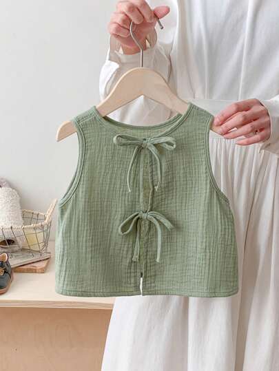 SHEIN LMoss Kids 年轻女孩 LMoss 休闲蝴蝶结细节宽松露背系带纹理面料 A 字背心春夏