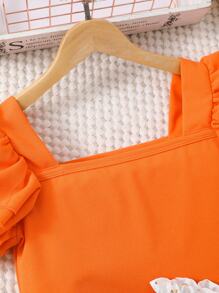 Set ragazza pre-adolescente con top a maniche corte monocolore e gonna con stampa in finitura metallica