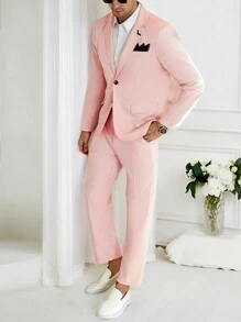 Manfinity Bizformal 男士商务派对INS套装，浅粉色西装套装，黑色衣领，精致的雄鹰标志刺绣设计。这款西装套装非常适合新年庆典、婚礼、情人节以及日常周年纪念等场合。黑色衣领增添一丝精致，而精致的标志刺绣则展现出独特的风格。这款西装让穿着者在各种场合都能展现自信魅力。男士两件套西装，粉色西装套装 - 粉色 - 查看 3