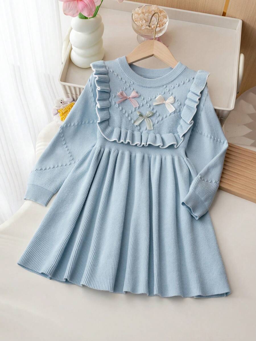 Souflis Souflis Váy len trang trí nơ hồng cho bé gái, váy dệt kim dài tay cổ tròn viền bèo nhún dễ thương - Màu xanh lam - Xem 1